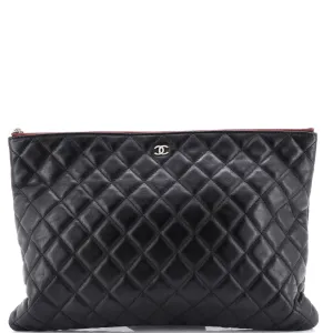 Chanel O Case Clutch Quilted Lambskin