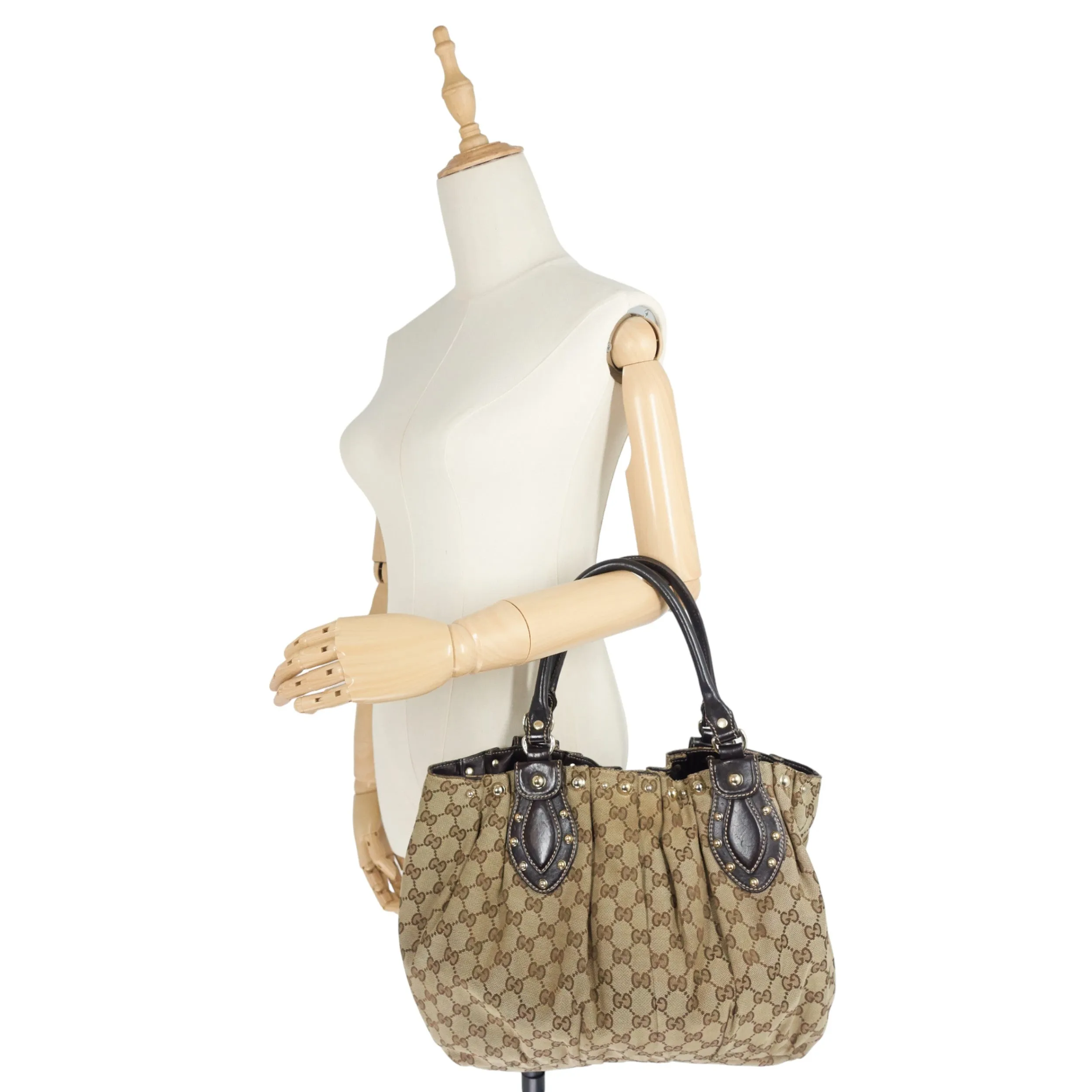 Pelham Medium Monogram Canvas Studded Hobo Bag